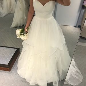 Brand new, never worn wedding gown.